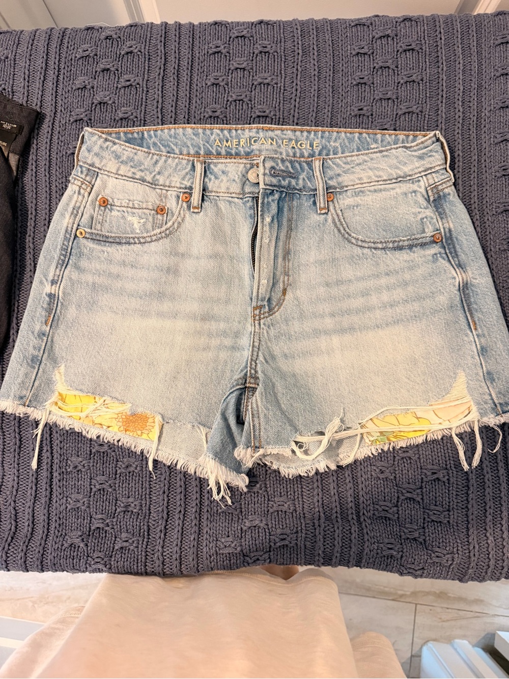 American Eagle Outfitters Light Wash Denim Shorts with Yellow Floral Patch